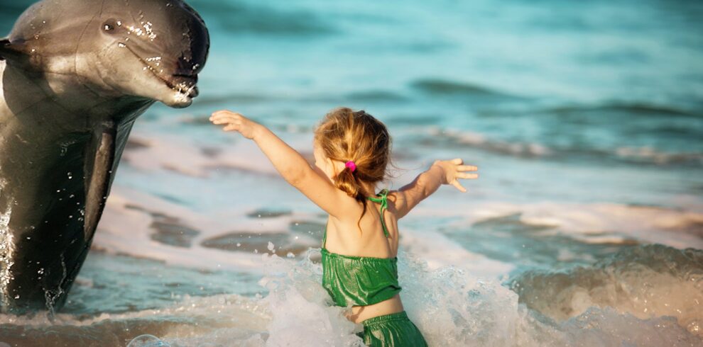 little-girl-and-a-dolphin-2023-11-27-05-06-17-utc